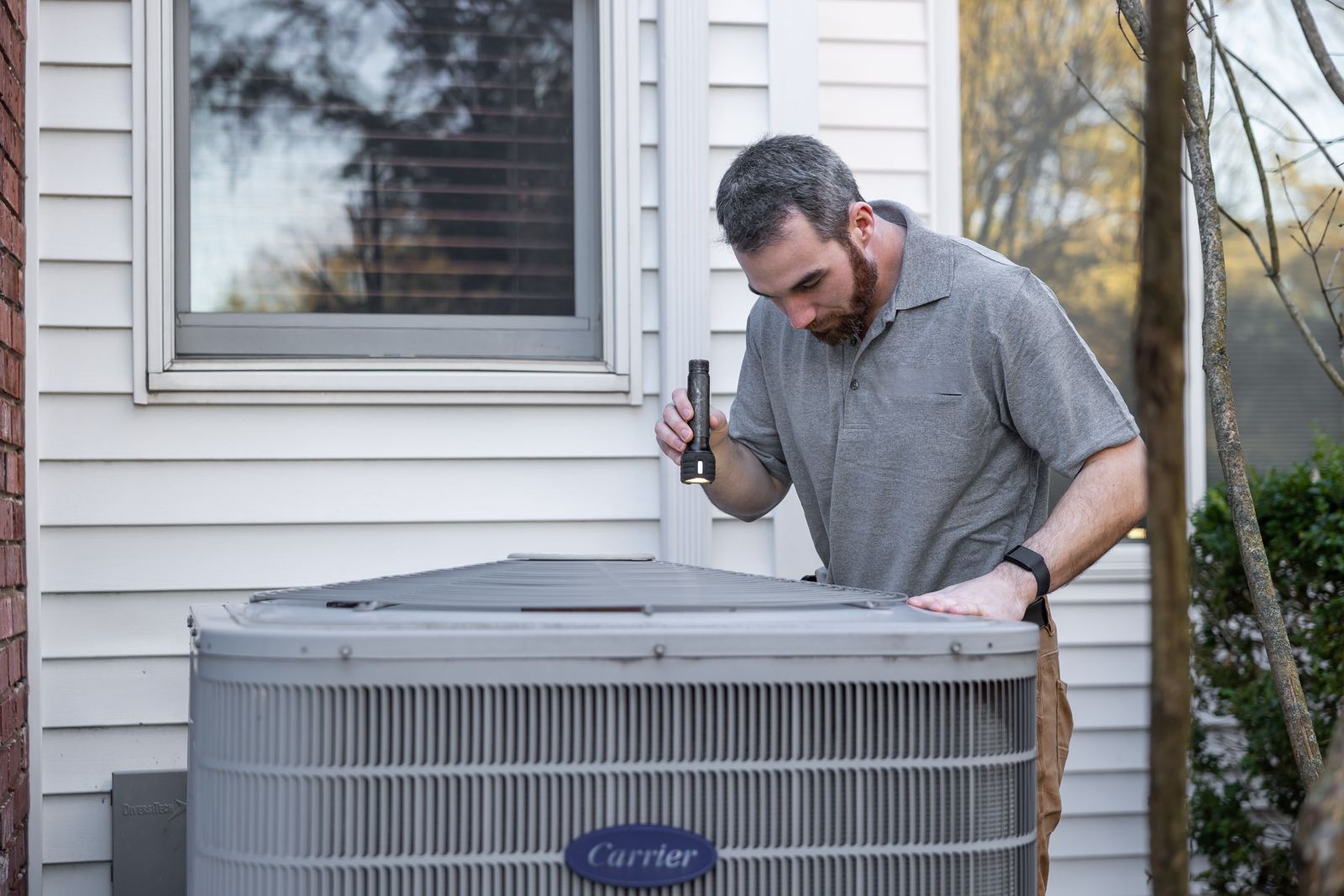 HVAC Technician trainee working on equipment